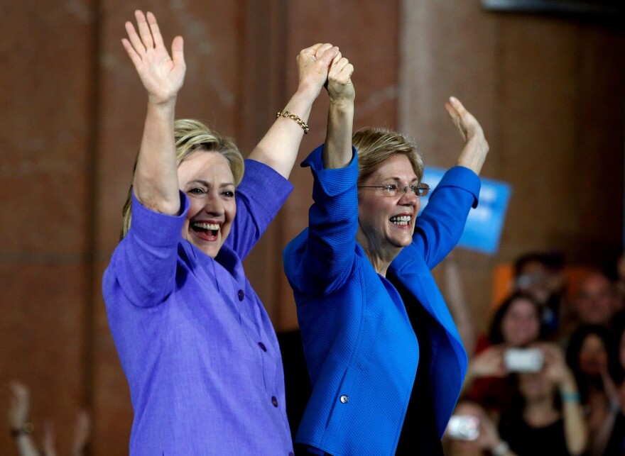 CINCINNATI, OH- JUNE 27:  Democratic Presidential candidate Hillary Clinton (L) and U.S. Sen Elizabeth Warren (D-MA) (R) wave to the crowd before a campaign rally at the Cincinnati Museum Center at Union Terminal June 27, 2016 in Cincinnati, Ohio. Warren is helping Clinton campaign in Ohio.   (Photo by John Sommers II/Getty Images)