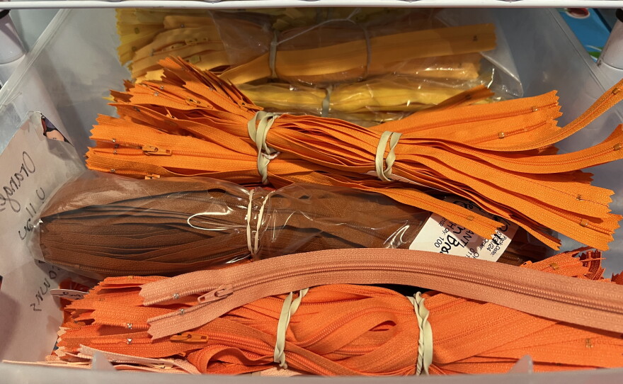Cochran has drawers of colorful zippers. She said many people donate them to the gang.