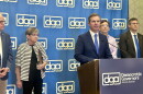 Kentucky Gov. Andy Beshear chairs the Democratic Governors Association. He stands alongside Democratic Governors Tim Walz of Minnesota, Laura Kelly of Kansas, Bob Ferguson of Washington and Matt Meyer of Delaware.