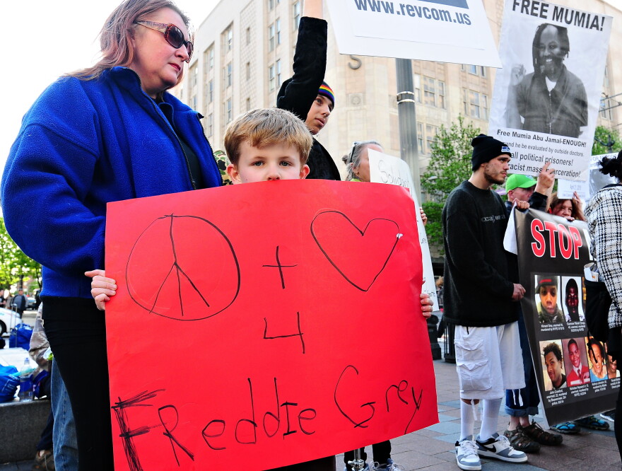 Kingston Howell, 7, joined a Seattle protest in support of Freddie Gray, a black man from Baltimore who died of injuries sustained in police custody.
