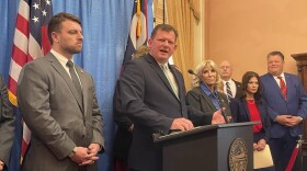 Ohio House Speaker Jason Stephens (R-Kitts Hill) speaks to reporters about his team's list of priority bills. Standing with him were 15 House Republicans who voted for him for speaker.