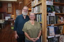 In this Sept. 1, 2026 photo, Wild Geese Books' new owners (from left) Bil and Julia Morrill are spending the days leading up to the stores opening cleaning and reorganizing the stock that came with the store when they bought it.