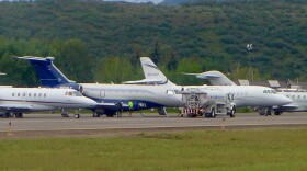 An Atlantic Aviation fuel truck helps fuel an airplane at the Aspen-Pitkin County Airport. The company is the fixed-base operator at the Aspen airport, providing services such as fuel and private plane parking.