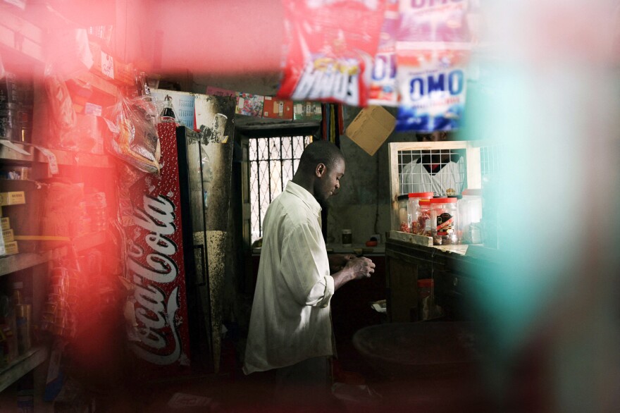 A shopkeeper win Zanzibar, photographed in 2005.