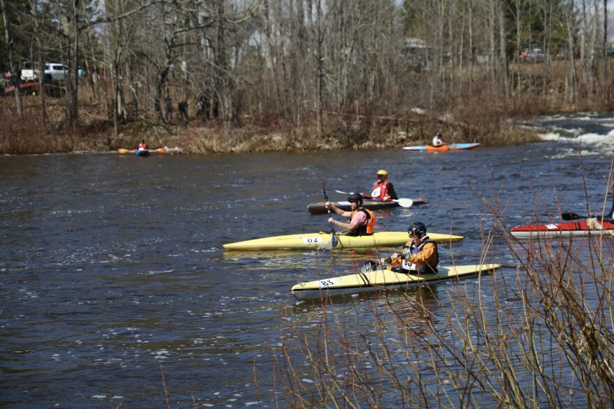 Paddlers travel through the white waters at Six Mile Falls during the Kenduskeag canoe race.