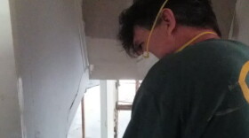 Anyone working in working in enclosed spaces where mold may have taken hold should were masks as well as gloves.