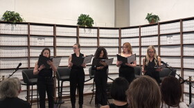 Actors read Sheri Wilner-Deering’s “The Does” in June of 2026 presented at the Donald J. Trump–Jeffrey Epstein Memorial Reading Room in Washington, D.C., a temporary installation of bound volumes of Epstein-related records. A Miami cast will present a staged reading at the Unitarian Universalist Congregation of Miami on Sunday, Oct. 4.