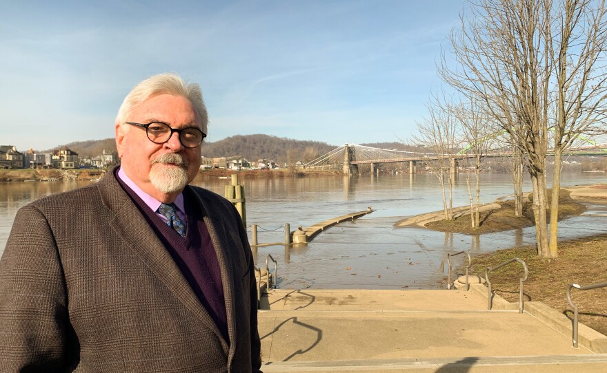 Patrick Cassidy, a labor and employment lawyer in Wheeling, W.Va., stands along the Ohio River. "When I see the Ohio Valley, even with the decline, I see opportunity."