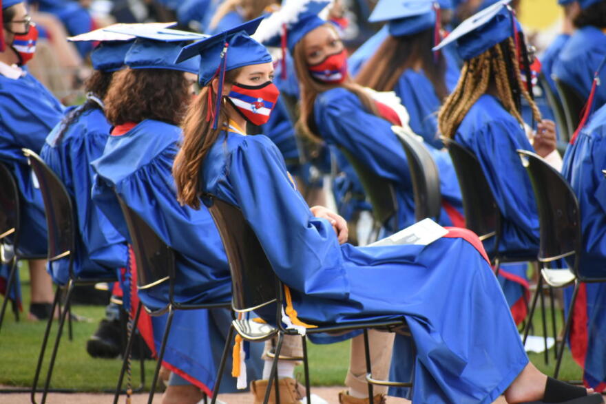 A high school graduation ceremony in South Bend, held outside due to COVID-19 safety precautions.