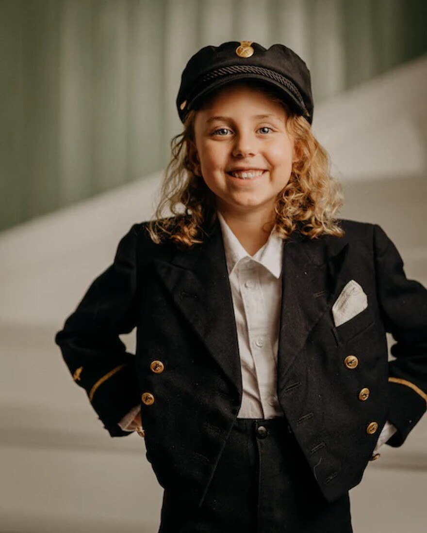 Child dressed as a pilot.
