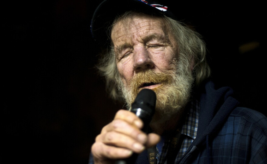 Paul "Papa" Rice, 74, has been a bartender for 17 years. Here, he performs "A Country Boy Can Survive" by Hank Williams Jr. at a karaoke night at the Keyhole Bar in Eureka, Nev.