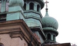 Roof damage due to fire can be seen at Tremont’s historic St. Theodosius Orthodox Cathedral. The church has defined the neighborhood’s skyline for 112 years.