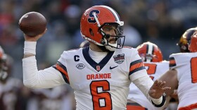 Syracuse quarterback Garrett Shrader (6) passes against Minnesota during the first half of the Pinstripe Bowl NCAA college football game Thursday, Dec. 29, 2022, in New York. (AP Photo/Adam Hunger)