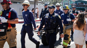 First responders with a patient at Deltopia in Isla Vista in 2024.