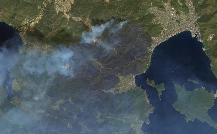 A satellite photo from the Turkish military shows wildfires in Mugla, Turkey, on Sunday.