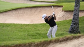 Brian Harman hits onto the 16th green during the third round of the Sony Open golf tournament, Saturday, Jan. 11, 2025, at Waialae Country Club in Honolulu.
