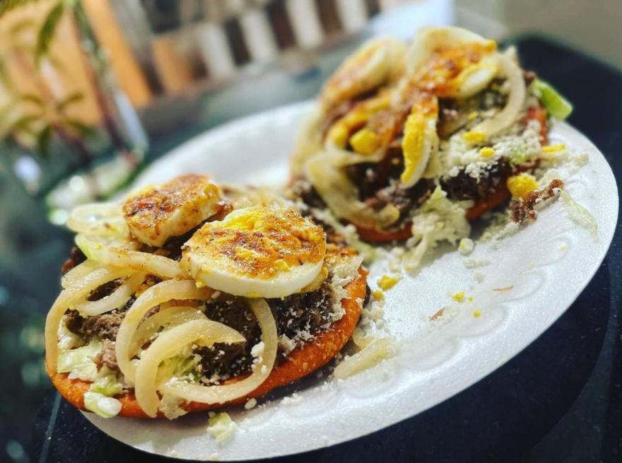 A plate with grilled pupusas