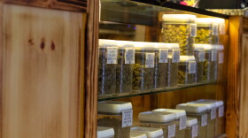 Shelves stocked with marijuana ready to be sold.