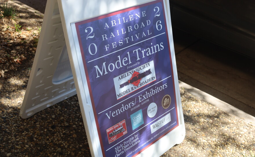 Sign outside of Cedar Street Coffeehouse where the model train exhibits and vendors were set up for the Abilene Railroad Festival. Photo by Allison Diaz.