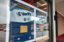 Employers enrolled in E-Verify are required to post information about the tool in an obvious place. These posters are displayed at the front entrance to the Keene Hannaford location. (Keene Sentinel photo)