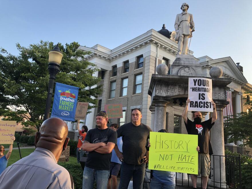 Protesters gather in front of the Confederate monument on Calloway County courthouse grounds, on July 15, 2020.