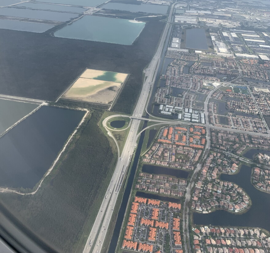 Developed areas abut wetlands in South Florida, where levees, pumps and other structures provide flood control.