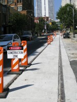 Construction of the Atlanta streetcar line has hurt many businesses along the route, but there is hope that economic gains will increase once the line opens next spring.