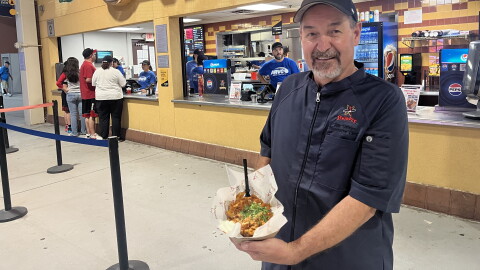 Albuquerque Isotopes head chef Jim Griego is a friendly guy, but he serves up a mean dish of nachos.