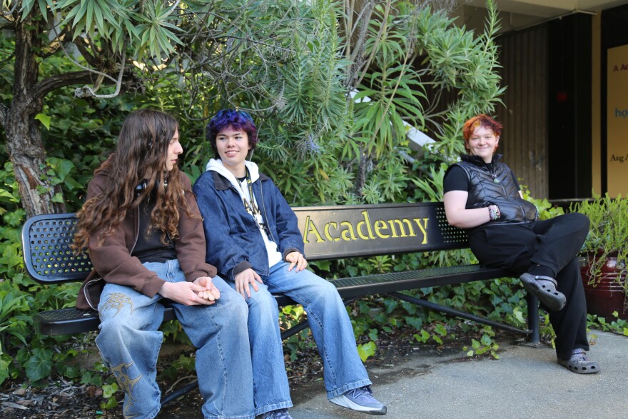 Academy students on campus. From left to right: Atticus Perez-Waters, Blue Mach-Zeiter, and Finnegan Kelly.