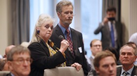 File photo: McCrae Dowless stands with his lawyer during the 9th District hearing.