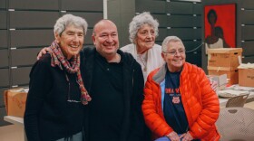 Liz Kennedy, far-left, Javier Bustillos, Madeline Davis and Bobbi Prebis pose for a picture during an event together.