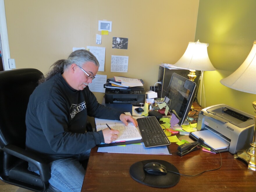 Bill LaValley of Big Boss Blues does therapist paperwork at his office