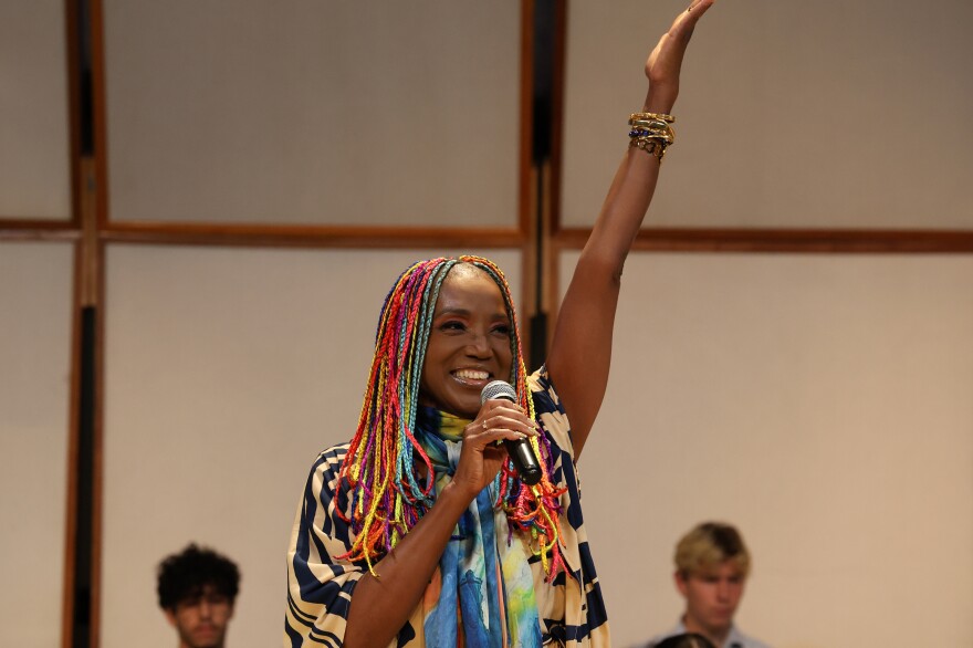 Woman sings on a stage