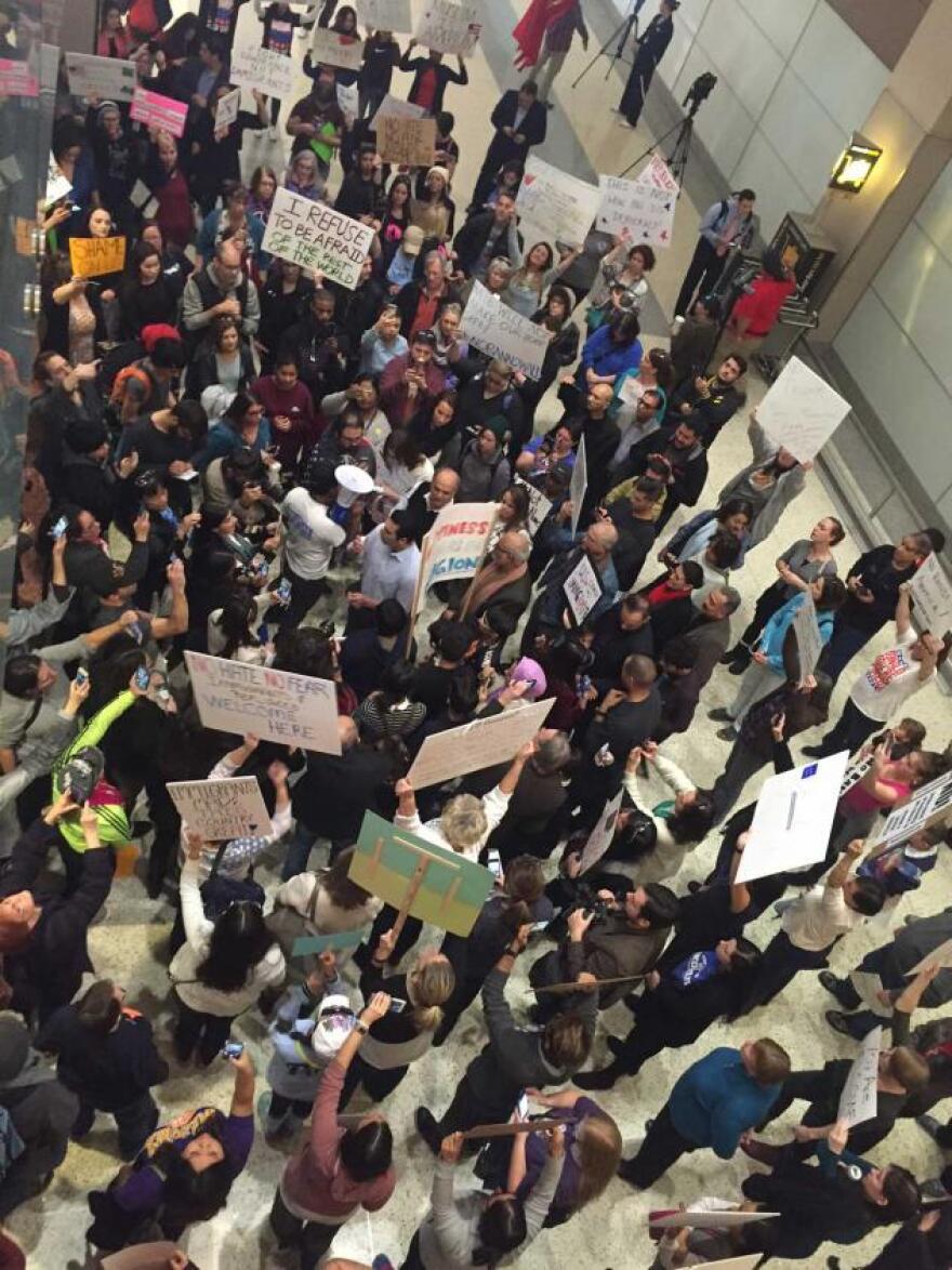 Group of protesters rallied at McCarran International Airport Sunday against Pres. Trump's immigration ban.