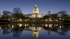 The U.S. Capitol building is seen before sunrise on Capitol Hill in Washington.