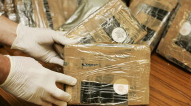 Confiscated bags containing cocaine are displayed. (Mark Renders/Getty Images)