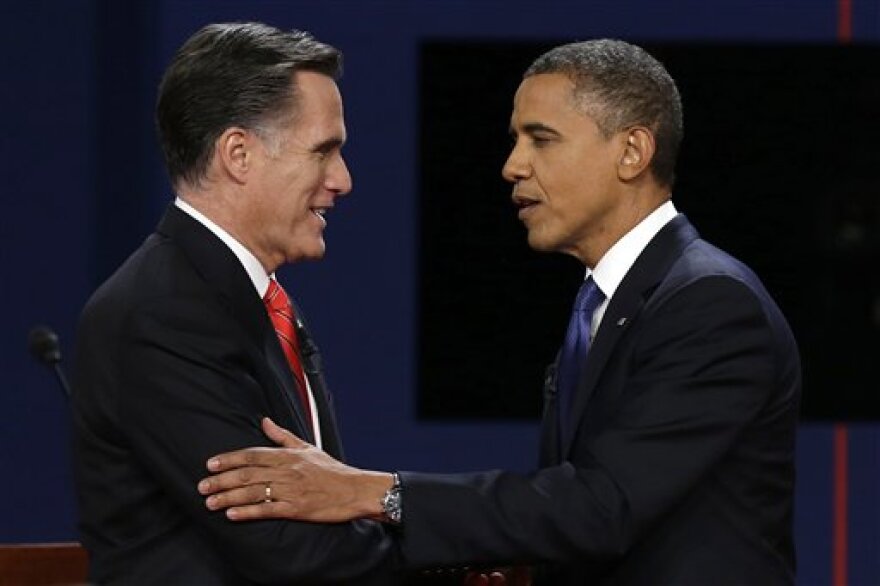Romney and Obama shaking hands before debate