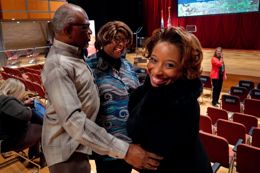 Ferguson Mayor Ella Jones, center, reacts while catching up with Dr. Kendra Holmes, President & CEO for Affinia Healthcare, right, on Wednesday, Jan. 20, 2024, before the annual State of the County address at the Touhill Performing Arts Center on the campus of the University of Missouri-St. Louis in north St. Louis County.