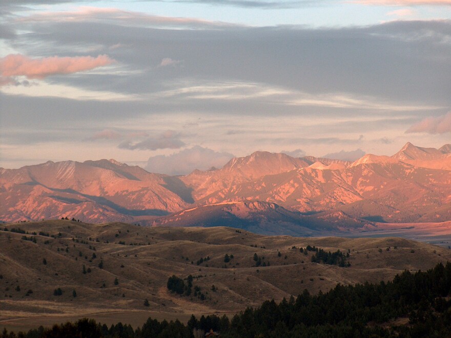 The sunset lights up the Crazy Mountains between Big Timber and Livingston on Oct. 17, 2005.