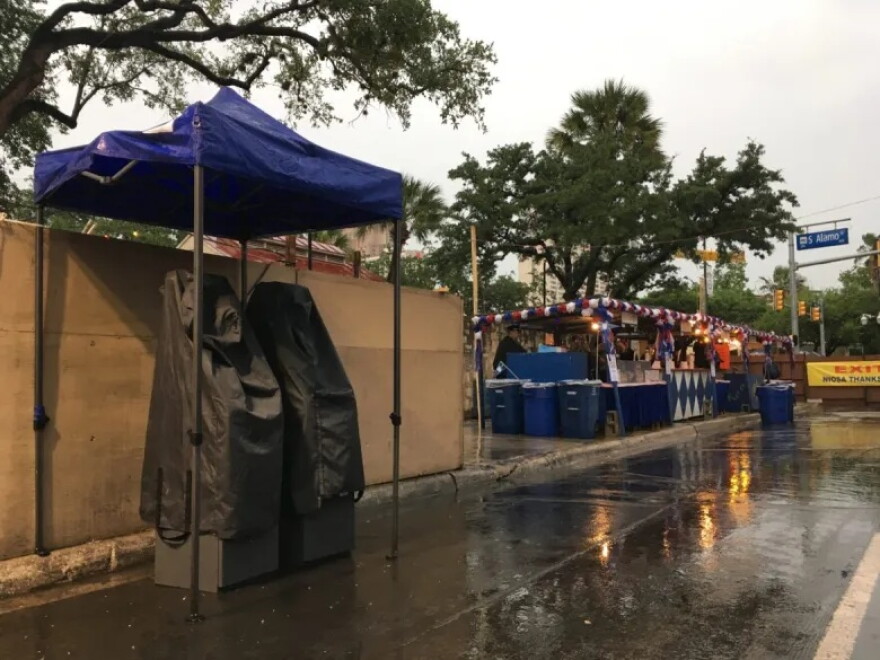Rain-covered ATMs await crowds as NIOSA’s night opening in 2018 was delayed due to bad weather.