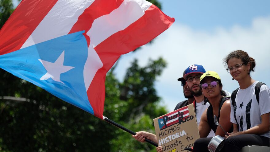 Demonstrators took to the streets Friday, a day after Puerto Rico Gov. Ricardo Rosselló announced he would resign. It is unclear who will take his place.