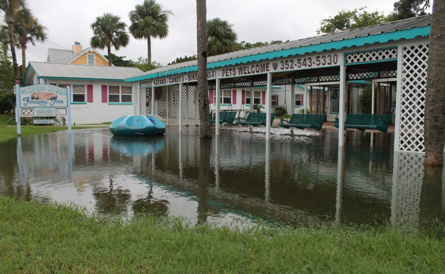 The front lawn of the Faraway Inn in Cedar Key is flooded with water after a storm surge from tropical storm Hermine. Inn employees rushed to remove anything that could be damaged from the rooms that border the flood zone.