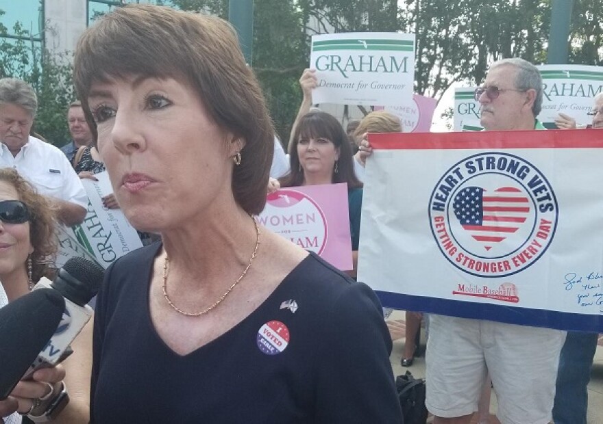 Gwen Graham speaks with reporters outside the Leon County Courthouse Thursday. Graham is on the last leg of her campaign ahead of the Tuesday primary. (8/23/2018)