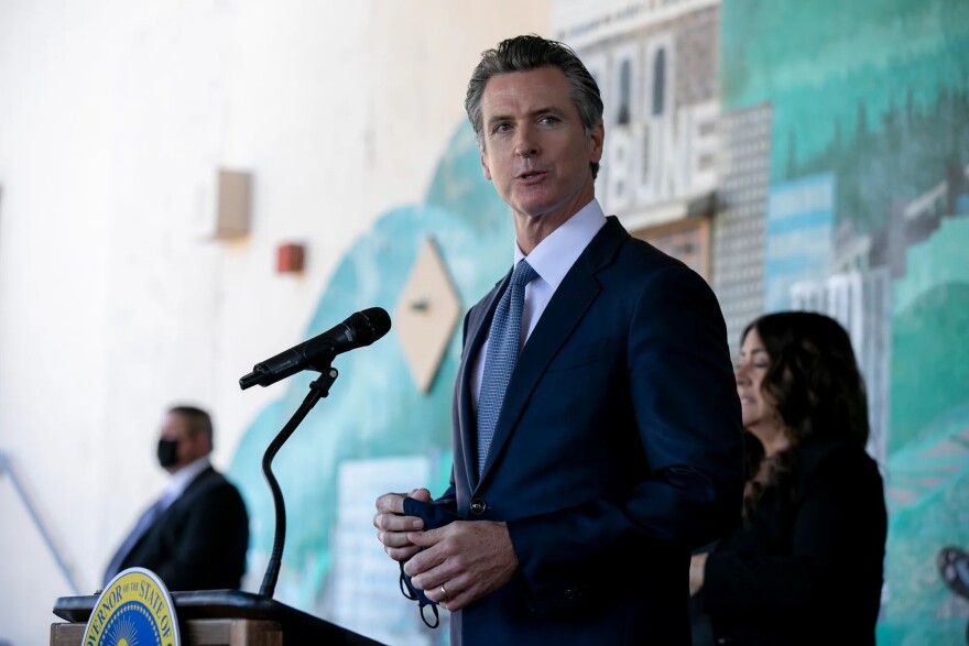 Gov. Gavin Newsom announces a new requirement for all school teachers and employees to show proof of vaccination or to undergo weekly COVID-19 testing at a press conference held at Carl B. Munck Elementary School in Oakland on Aug. 11, 2021.
