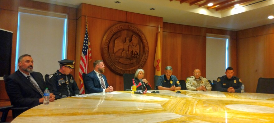 Gov. Michelle Lujan Grisham Friday announces the public health emergency on gun violence with law enforcement officials on hand.