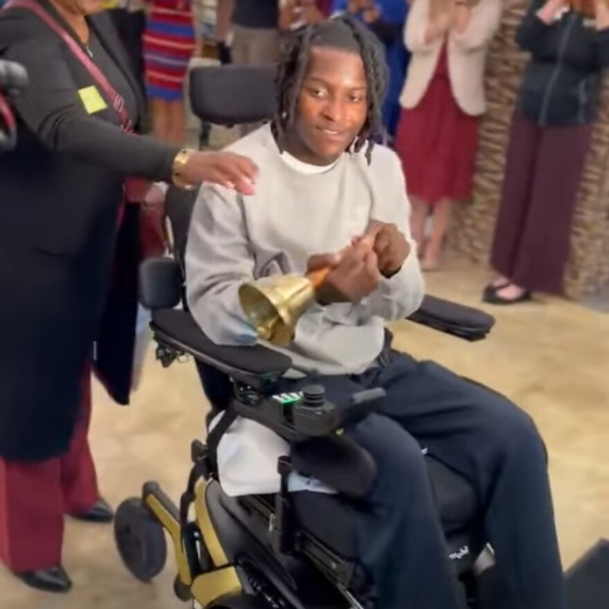 Ethan Pritchard rings the bell as he leaves a Jacksonville rehabilitation facility 