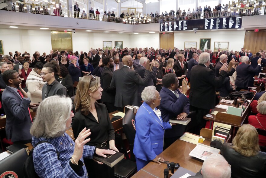 FILE - Members take the oath of office at the opening session of the N.C. House at the Legislative Building, Jan. 8, 2025, in Raleigh, N.C. 