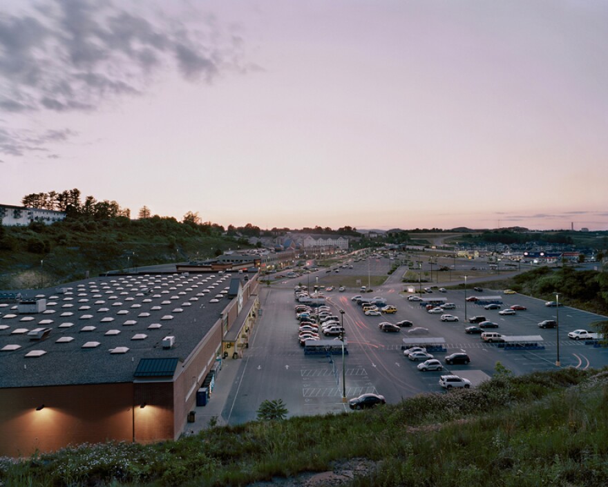 Suncrest Town Center, Morgantown, W.Va. “It was less than a mile from our house,” Sherwin said, “and I was shopping there. I was kind of torn by this kind of dual-identity of this landscape. And so one evening I decided I wanted to photograph it.”