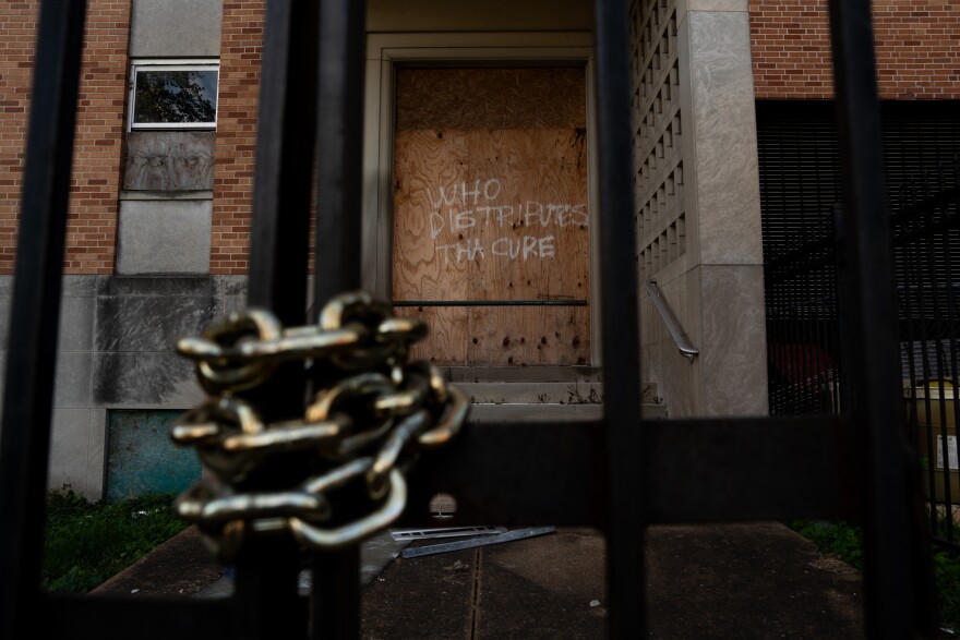 Doors and windows are boarded up at the shuttered St. Alexius Hospital on Tuesday, Oct. 7, 2025, in St. Louis’ Gravois Park neighborhood.