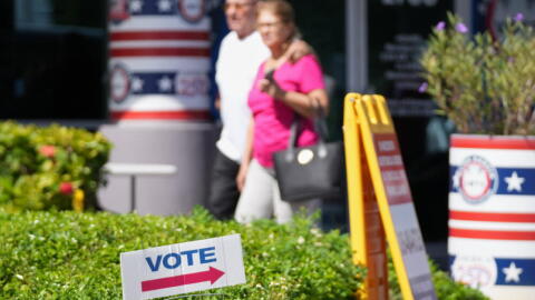 People walk from the Office of the Supervisor of Elections during early voting in the 2026 midterm elections, Tuesday, Oct. 27, 2026, in Doral, Fla. (Lynne Sladky/AP)
